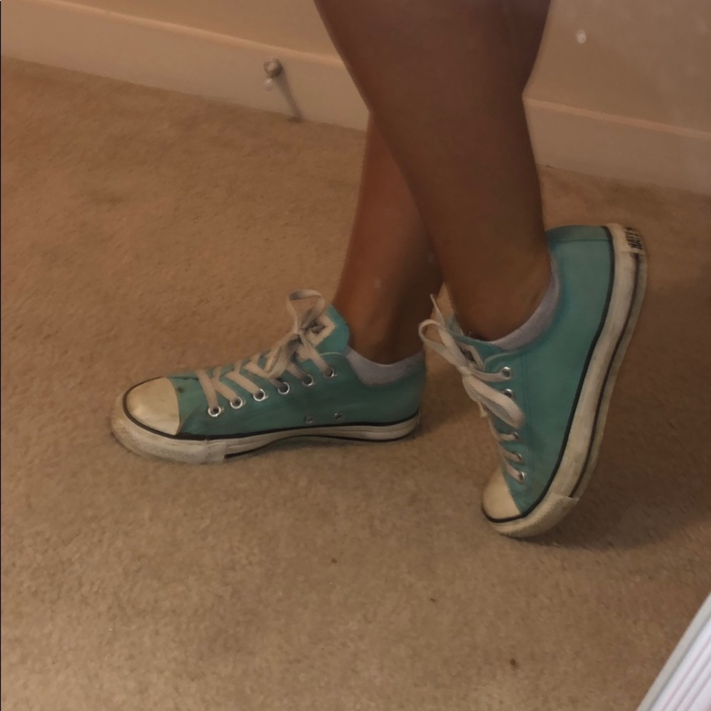 Teal blue converse.